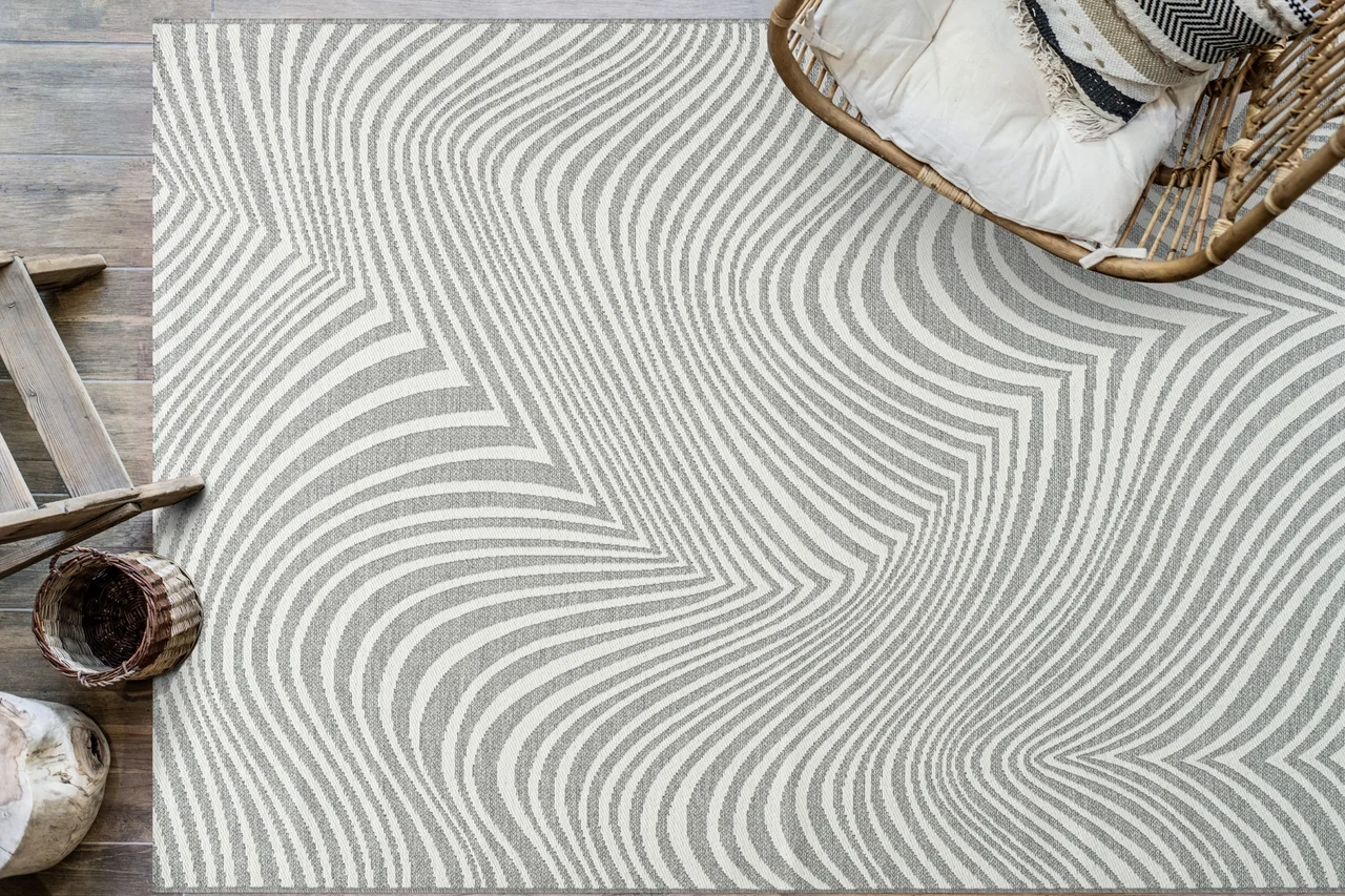 Illustration - Ihr Experte für schönes Wohnen - Ein moderner Teppich im Zebrastreifen Look im Wohnzimmer